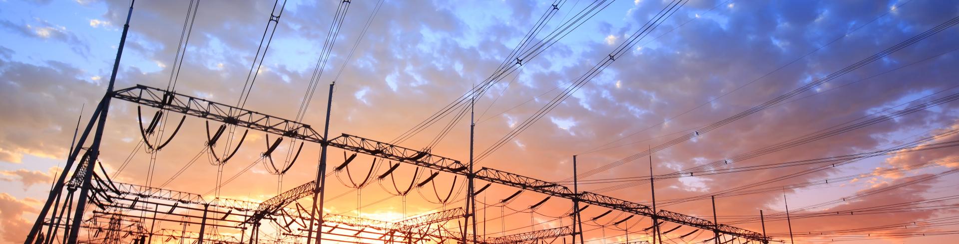 Solar photovoltaic panels and substations in the evening